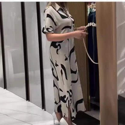 Jolira | Elegant fitted waist dress with irregular print