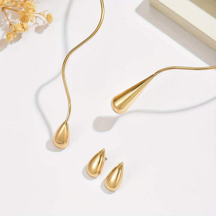 Taliah™ Elegant Necklace and Earring Set with Asymmetrical Drop Design