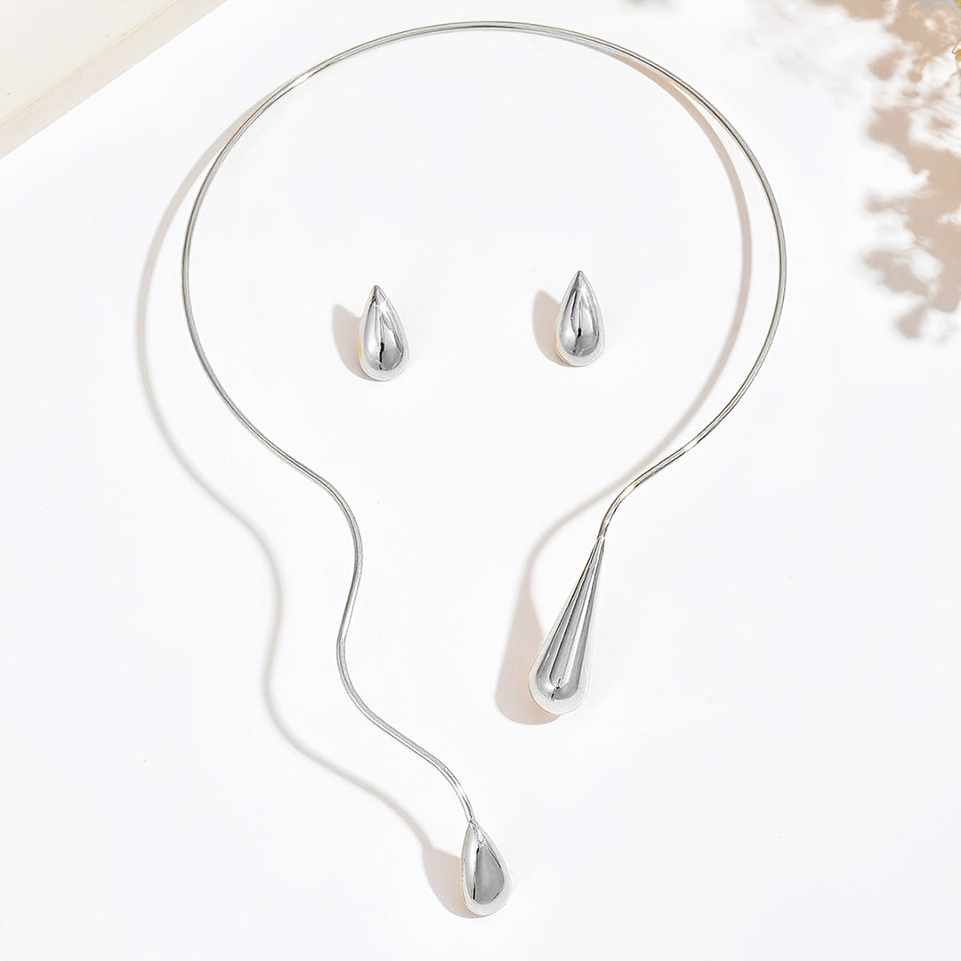Taliah™ Elegant Necklace and Earring Set with Asymmetrical Drop Design