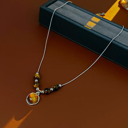Lucia | Tiger Eye Necklace with Circular Pendant and Timeless Elegance