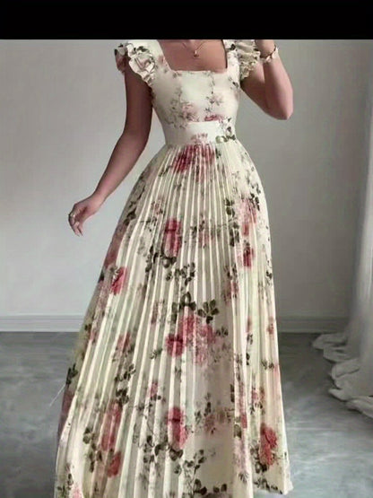 Oxeris | Long Floral Dress with Pleats and Timeless Elegance