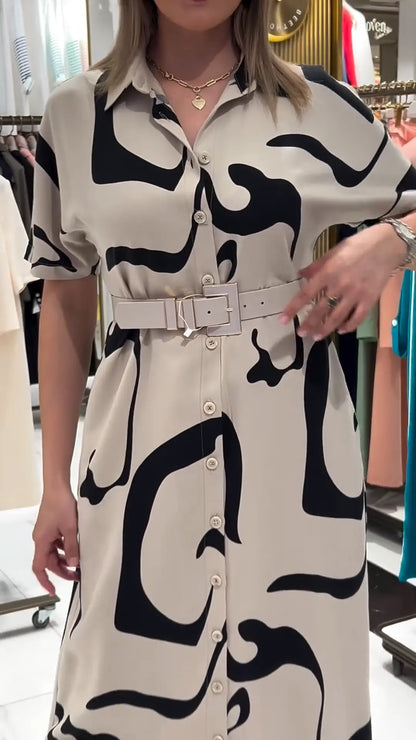Jolira | Elegant fitted waist dress with irregular print