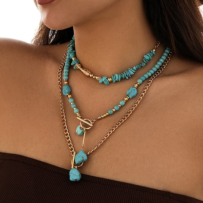 Evelise | A set of three stacked bohemian turquoise bead necklaces for women