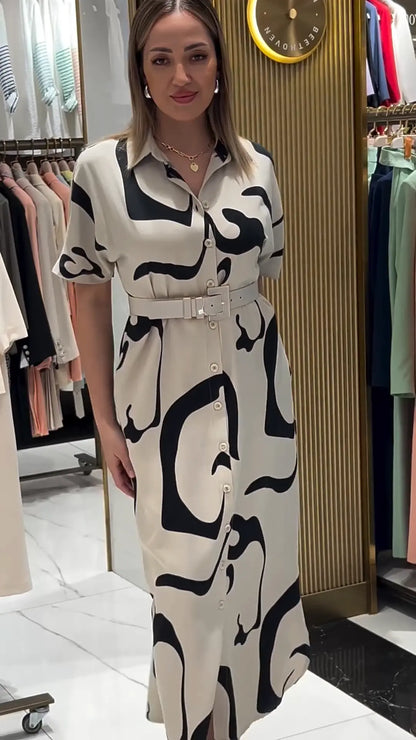 Jolira | Elegant fitted waist dress with irregular print