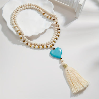 Esther | Long Y-Shaped Necklace with Turquoise Heart, Wooden Beads, and Bohemian Tassel