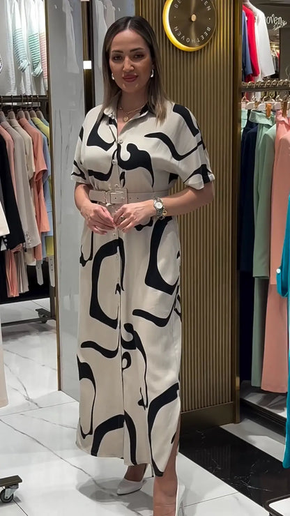 Jolira | Elegant fitted waist dress with irregular print