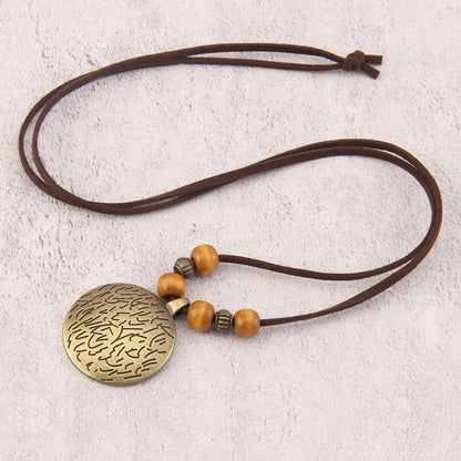 Vance | Vintage-Style Long Beaded Necklace with Round Pendant