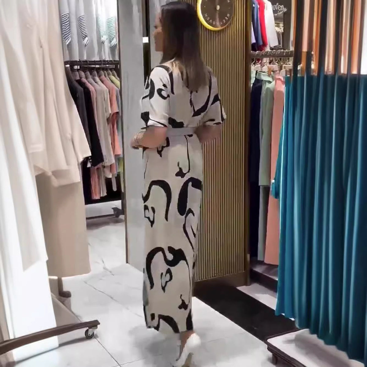 Jolira | Elegant fitted waist dress with irregular print